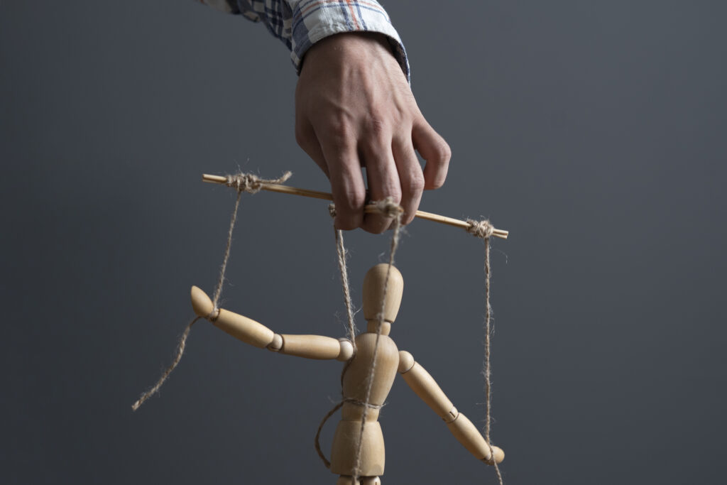 a hand manipulate threaded puppet marionette huma 2022 09 19 19 29 57 utc