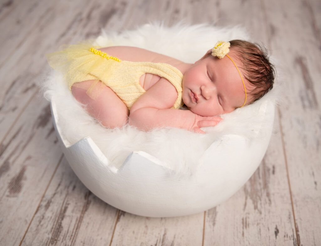 funny sleeping baby in yellow romper on round cot 2023 11 27 05 21 42 utc 1