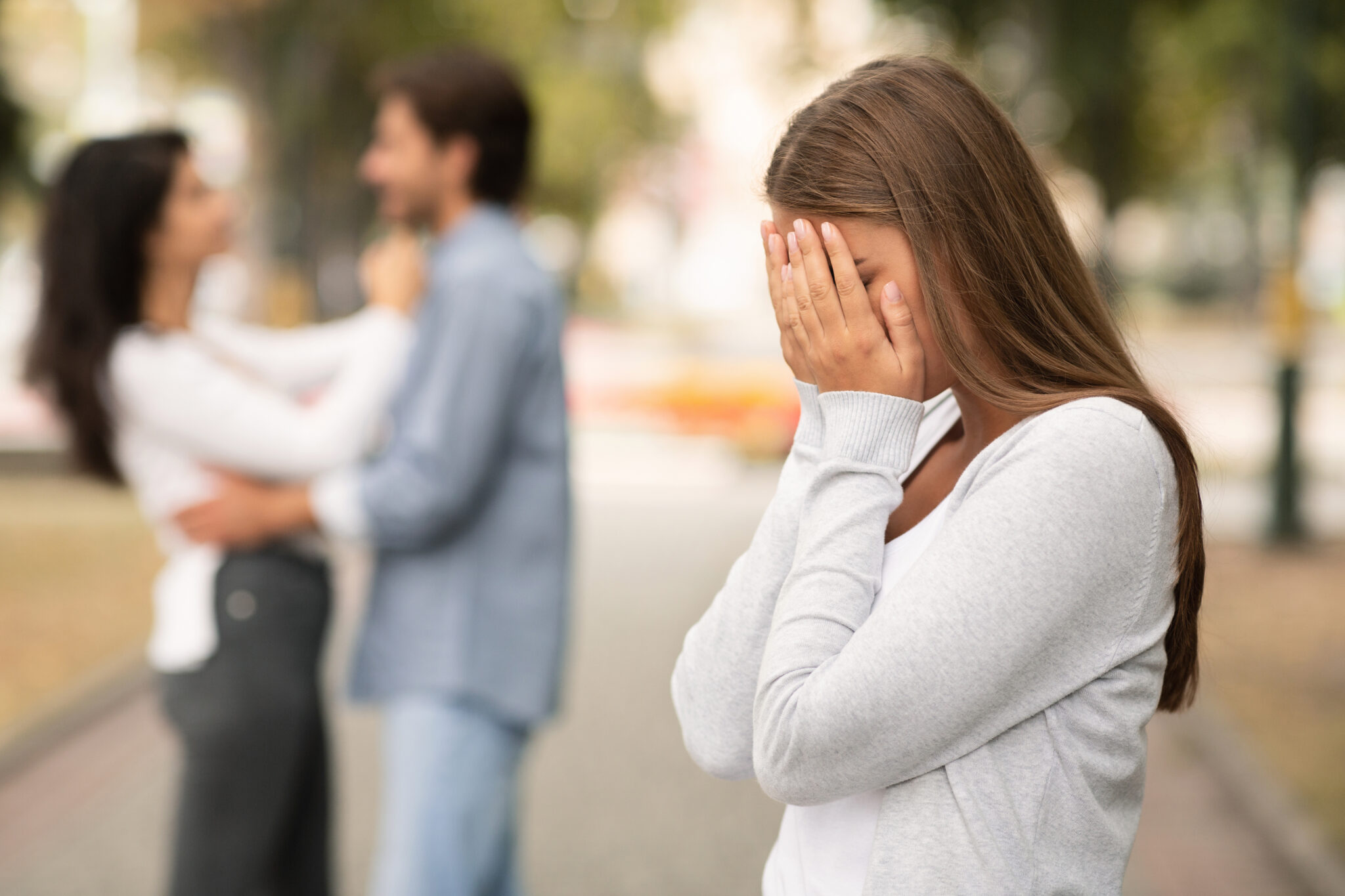 upset woman crying seeing her boyfriend with othe 2023 11 27 05 27 40 utc scaled